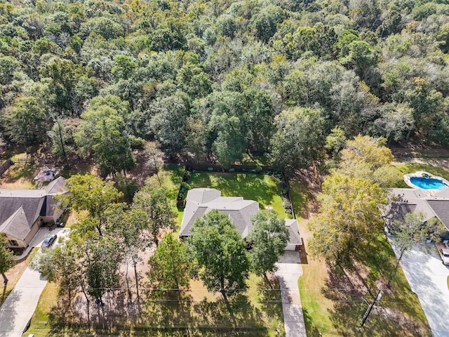 drone / aerial view with a forest view