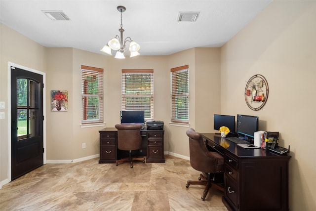 office space with baseboards, visible vents, and a chandelier