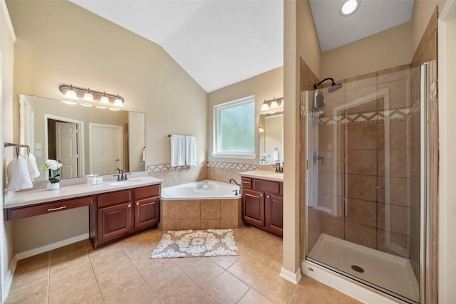 full bath featuring a garden tub, two vanities, a sink, a shower stall, and lofted ceiling