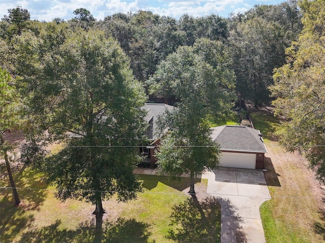 aerial view featuring a view of trees