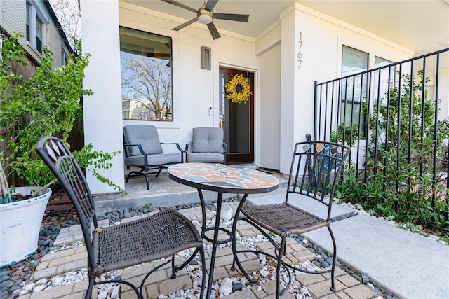 view of patio with ceiling fan