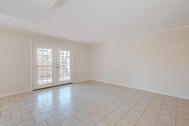 empty room with light tile patterned floors, french doors, baseboards, and ornamental molding