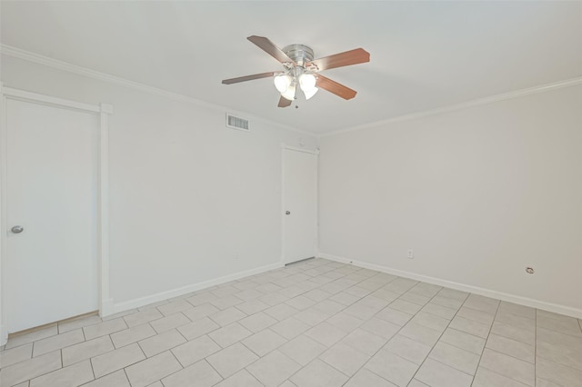 unfurnished room with a ceiling fan, baseboards, visible vents, and ornamental molding