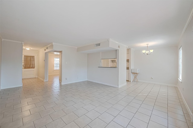 unfurnished living room featuring visible vents, a notable chandelier, crown molding, light tile patterned floors, and baseboards