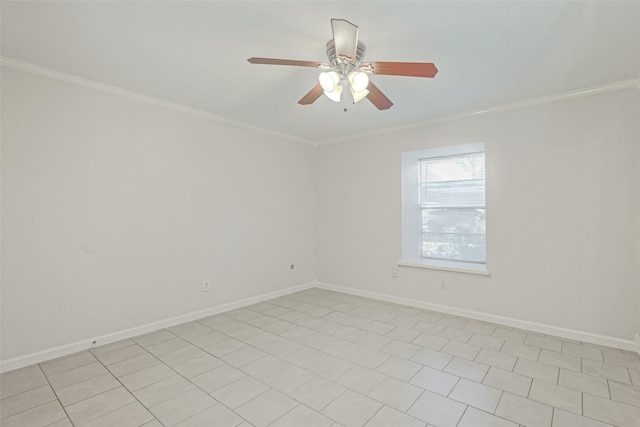 empty room with baseboards, ornamental molding, and a ceiling fan