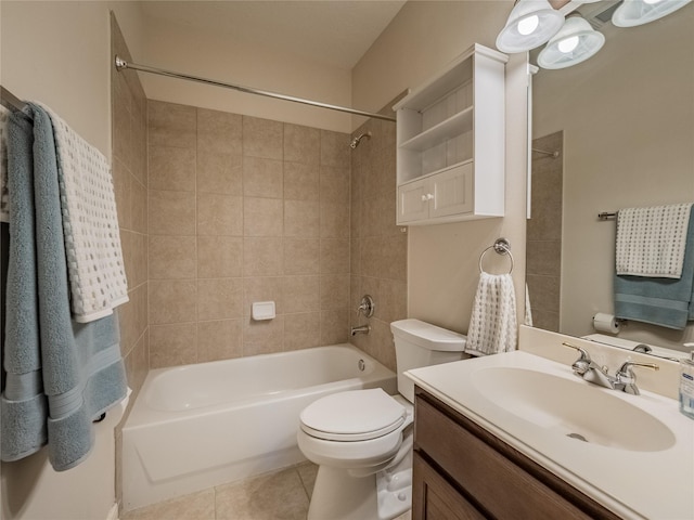 full bathroom featuring tile patterned flooring, vanity, toilet, and shower / tub combination