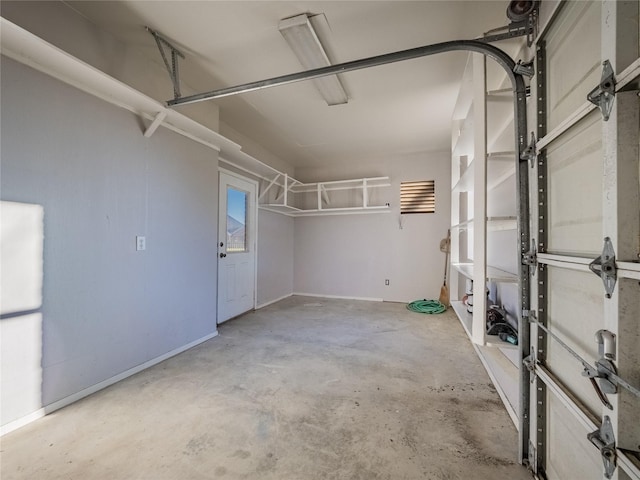 garage with baseboards