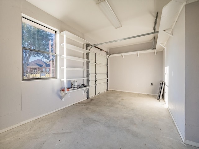 garage featuring baseboards