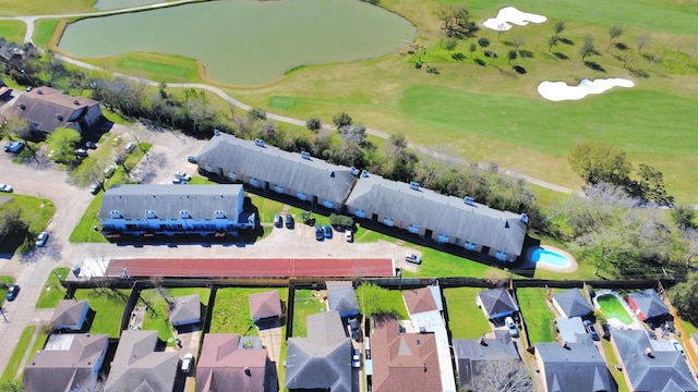 birds eye view of property with a residential view and view of golf course