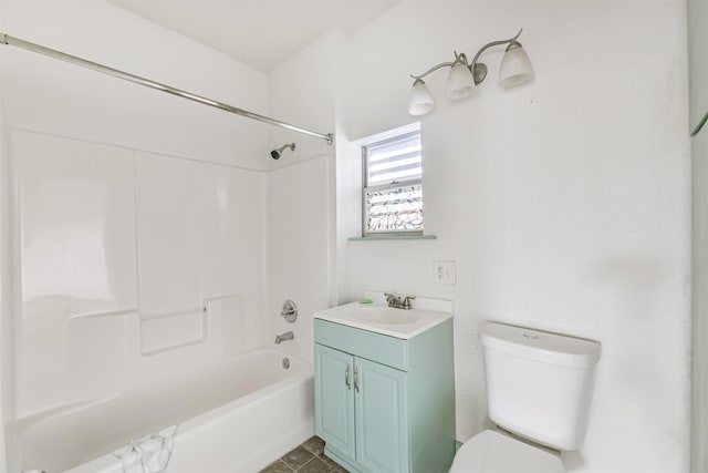 full bathroom featuring toilet,  shower combination, and vanity