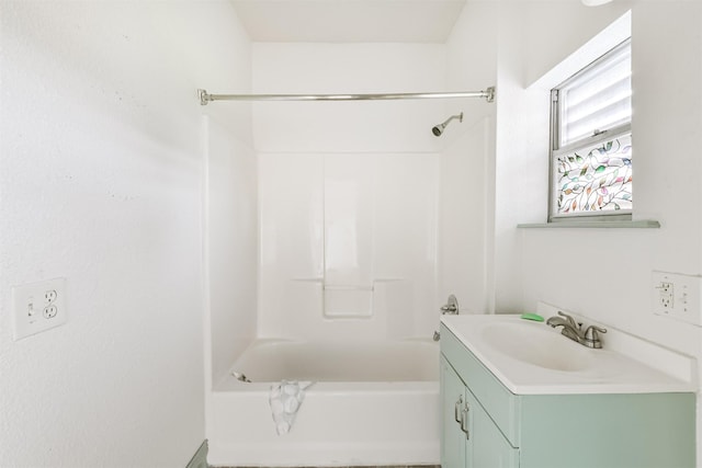 full bathroom with shower / washtub combination and vanity