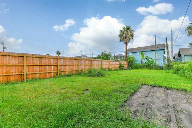 view of yard with fence