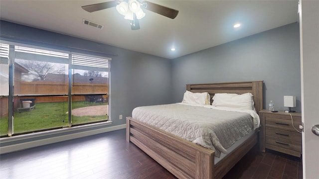 bedroom with visible vents, baseboards, ceiling fan, dark wood finished floors, and recessed lighting