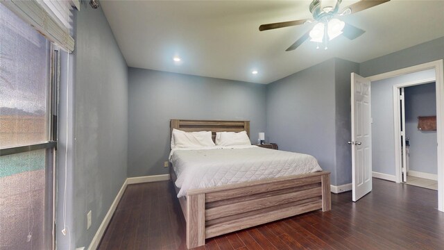 bedroom featuring recessed lighting, ceiling fan, dark wood-type flooring, and baseboards