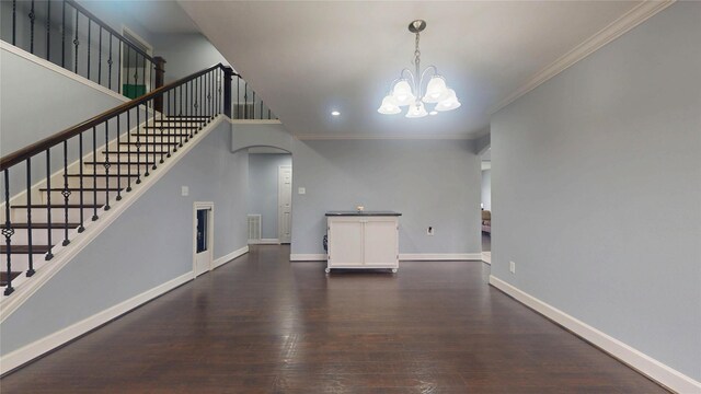 unfurnished living room with stairway, baseboards, an inviting chandelier, dark wood-style flooring, and ornamental molding