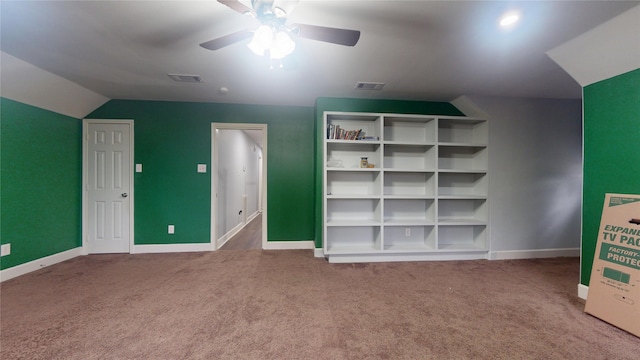 unfurnished bedroom featuring visible vents, carpet floors, baseboards, and a ceiling fan