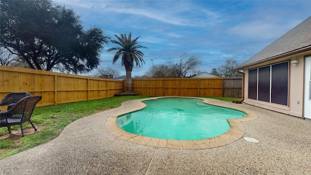 view of pool with a fenced in pool, a patio, and a fenced backyard