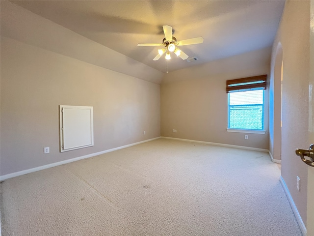 unfurnished room with ceiling fan, baseboards, visible vents, and light carpet