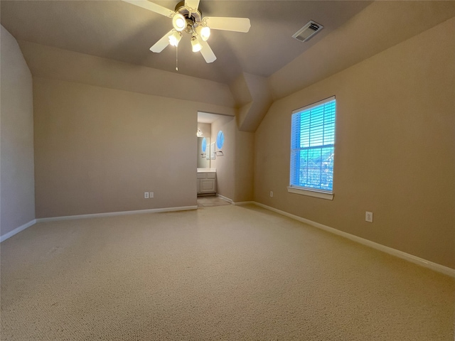 empty room featuring visible vents, baseboards, and ceiling fan