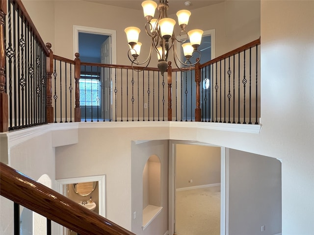 interior details featuring a notable chandelier