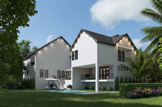 back of house featuring brick siding, stairway, stucco siding, and a yard