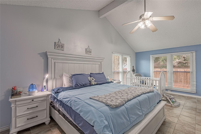 tiled bedroom with lofted ceiling with beams, baseboards, a textured ceiling, and a ceiling fan