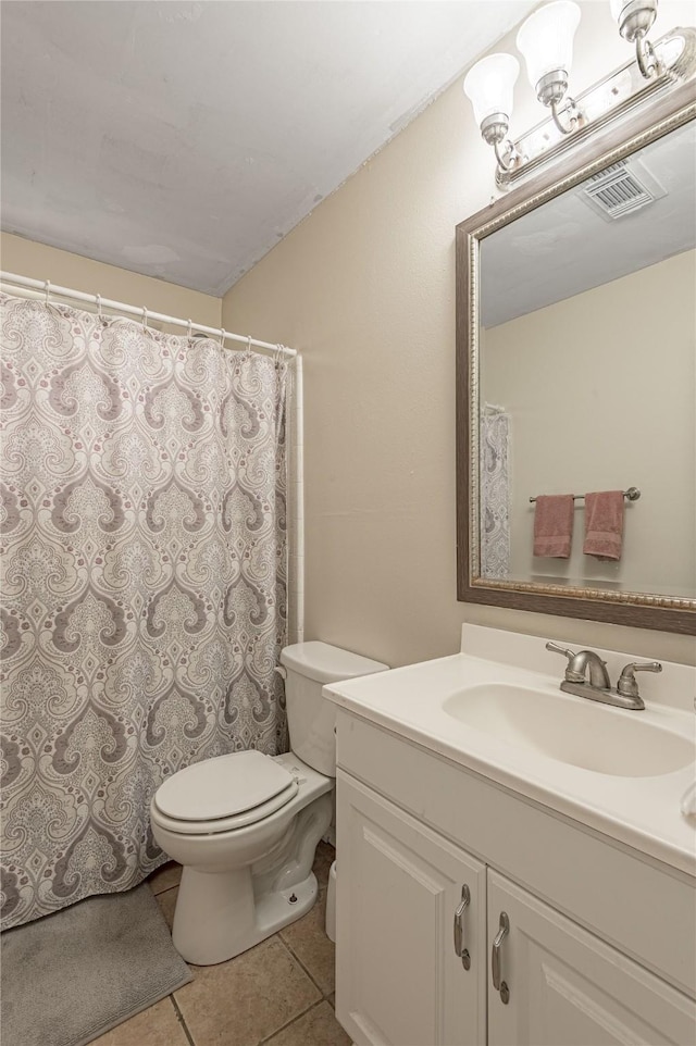 bathroom featuring visible vents, a shower with curtain, toilet, tile patterned flooring, and vanity