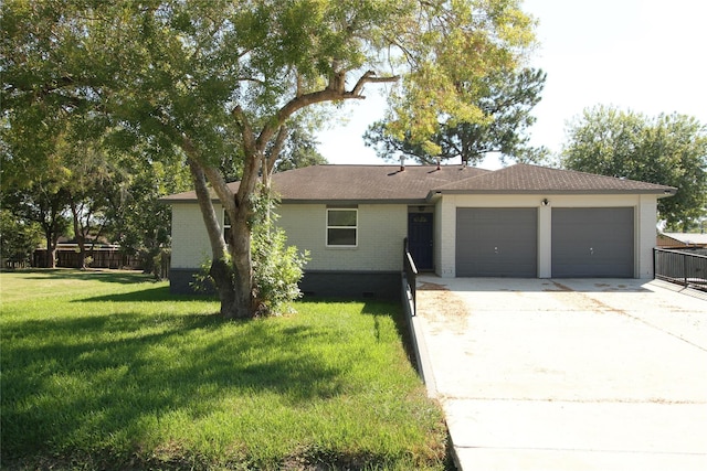 ranch-style home featuring brick siding, driveway, a front lawn, and a garage