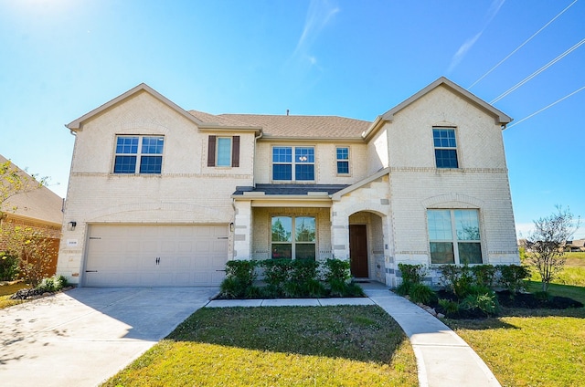 view of front of house featuring concrete driveway, an attached garage, brick siding, and a front lawn