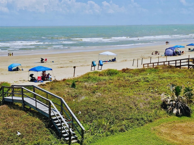 property view of water featuring a beach view