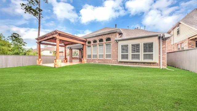 back of property featuring brick siding and a lawn