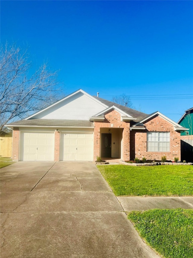 ranch-style house featuring a front lawn, concrete driveway, brick siding, and an attached garage