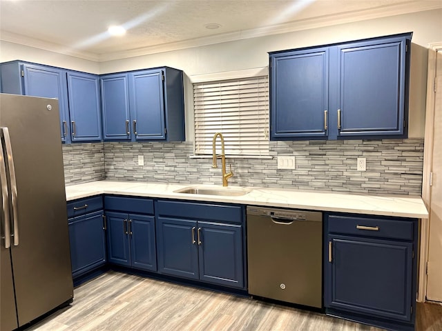 kitchen featuring blue cabinetry and stainless steel appliances