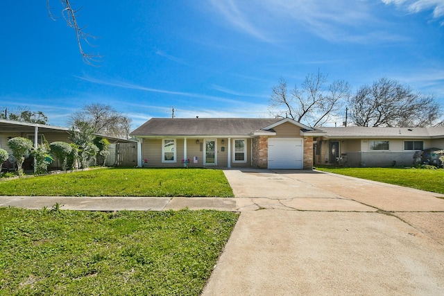 ranch-style house featuring a front yard, concrete driveway, brick siding, and an attached garage