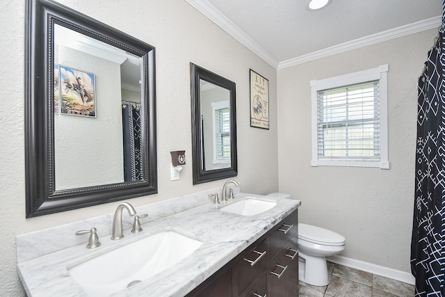 full bath featuring double vanity, ornamental molding, toilet, and a sink