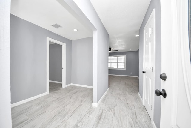 spare room featuring recessed lighting, visible vents, baseboards, and a ceiling fan