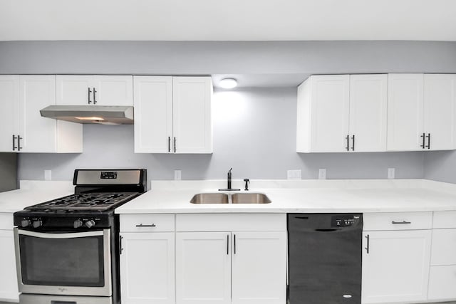 kitchen featuring under cabinet range hood, black dishwasher, stainless steel gas range, white cabinetry, and a sink