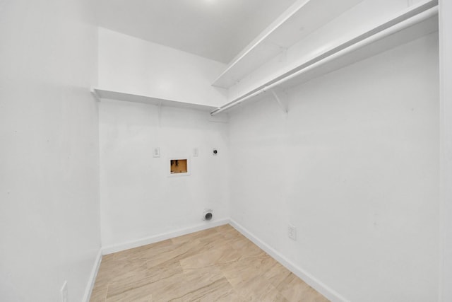 washroom featuring hookup for a washing machine, baseboards, hookup for an electric dryer, laundry area, and hookup for a gas dryer