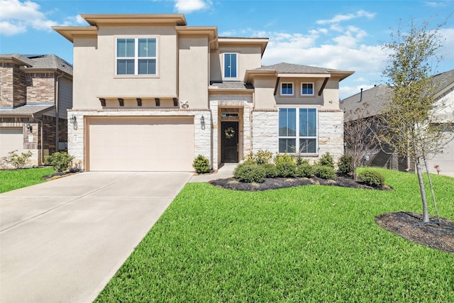 prairie-style house featuring concrete driveway, a front yard, stucco siding, stone siding, and an attached garage