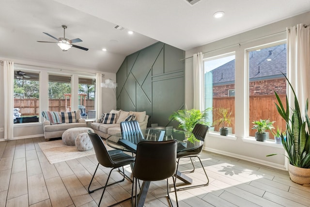 interior space featuring vaulted ceiling and ceiling fan