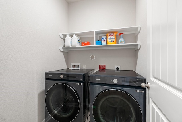 washroom featuring laundry area and independent washer and dryer