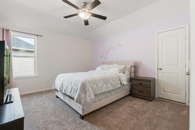 bedroom featuring carpet flooring, baseboards, and ceiling fan