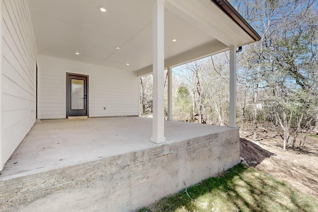 view of patio featuring a carport