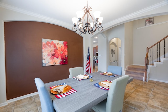 dining area with stairway, arched walkways, an inviting chandelier, and ornamental molding