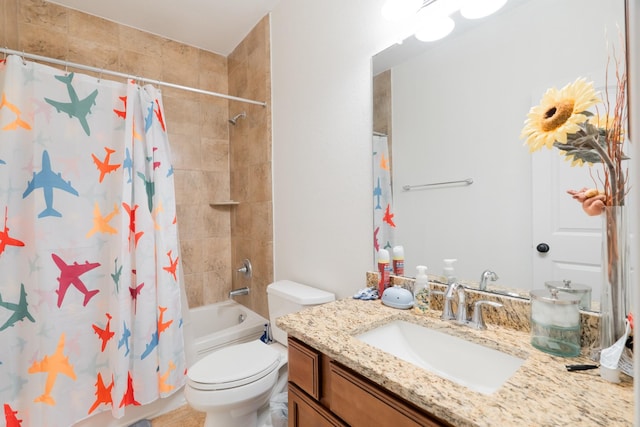 bathroom featuring toilet, shower / bath combo with shower curtain, and vanity