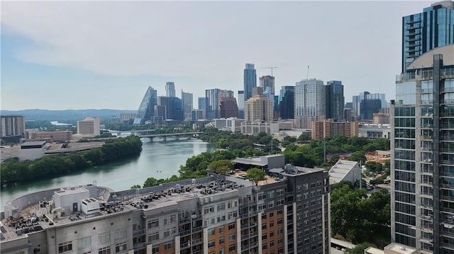 property's view of city featuring a water view