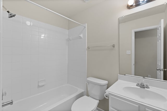 full bath featuring vanity, toilet, and shower / bathtub combination