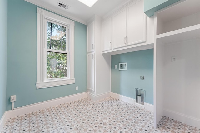 1214 Heights Blvd, Houston, TX 77008 - clothes washing area featuring electric dryer hookup, visible vents, washer hookup, cabinet space, and baseboards