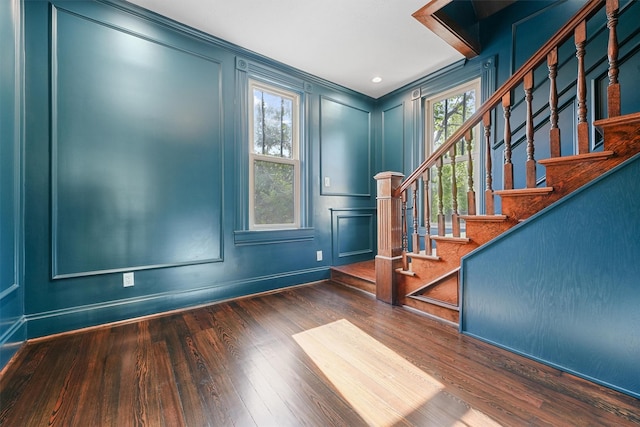1214 Heights Blvd, Houston, TX 77008 - foyer entrance featuring stairway, wood finished floors, and a decorative wall