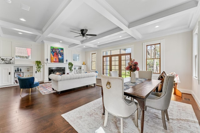 1214 Heights Blvd, Houston, TX 77008 - dining room featuring visible vents, dark wood-type flooring, beamed ceiling, a glass covered fireplace, and coffered ceiling
